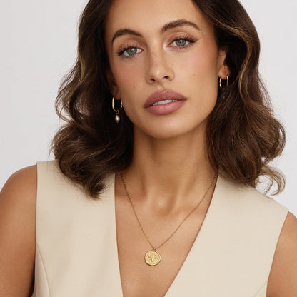 Collar Brújula Dorada