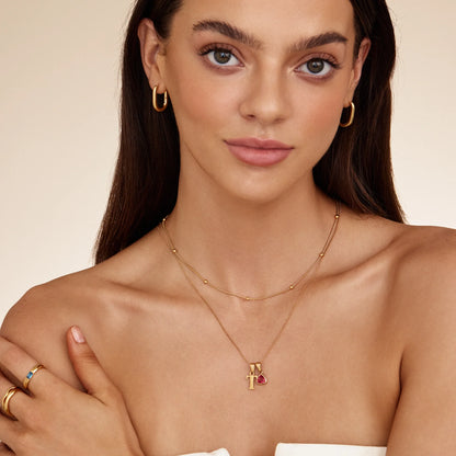 Collar con dije de piedra de nacimiento inicial