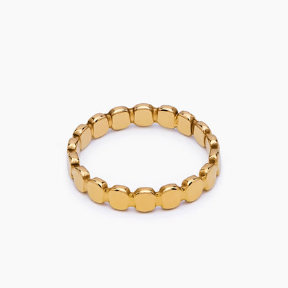 Anillo dorado con cuentas