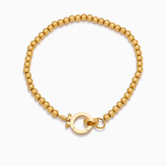 Pulsera Cuentas Doradas Esencial en Baño Oro 18k — Mujer