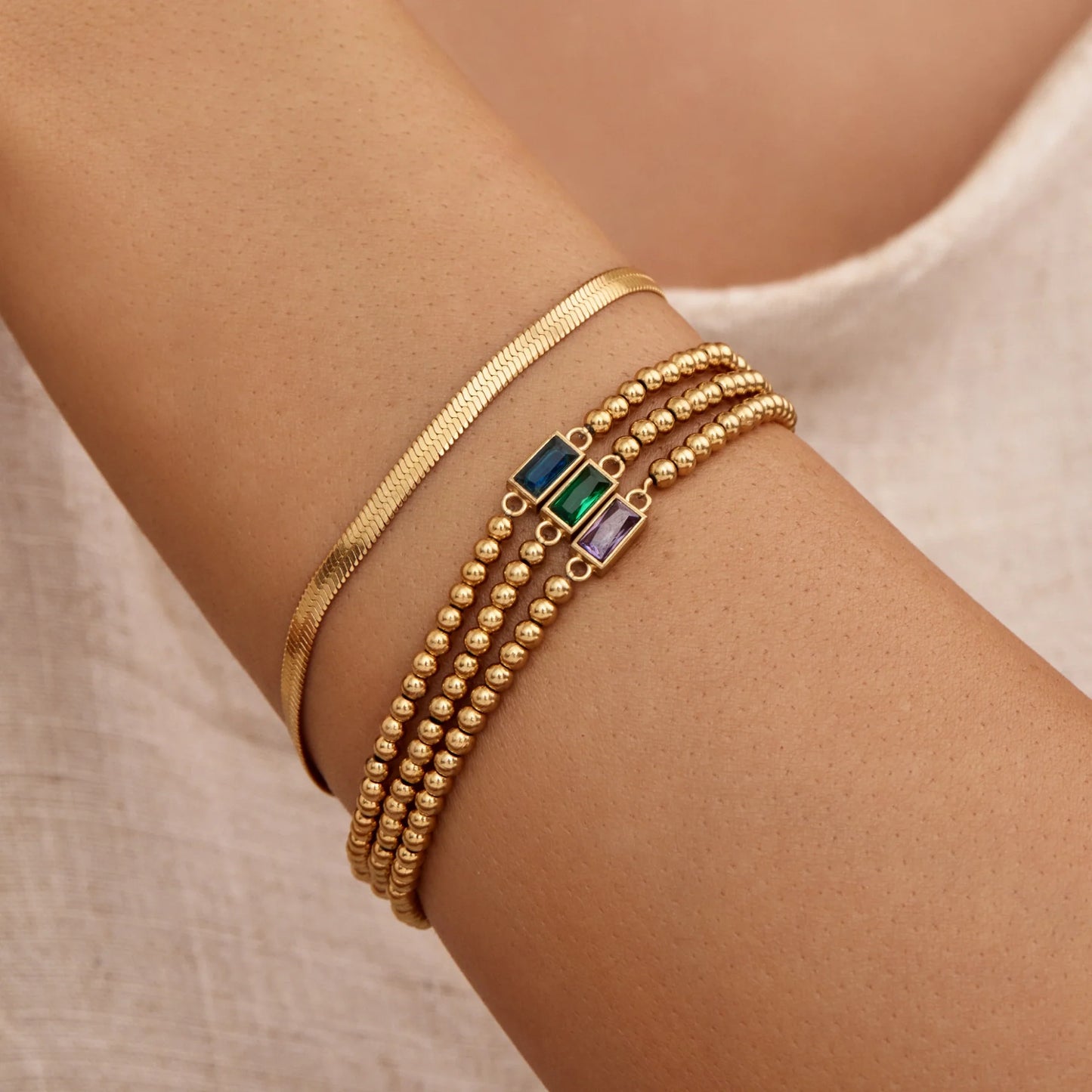 Pulsera de Cuentas Doradas con Piedra Natal en Baño de Oro de 18k — Mujer