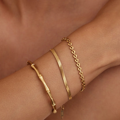 Pulsera Cadena de Corazones en Baño Oro 18k — Mujer