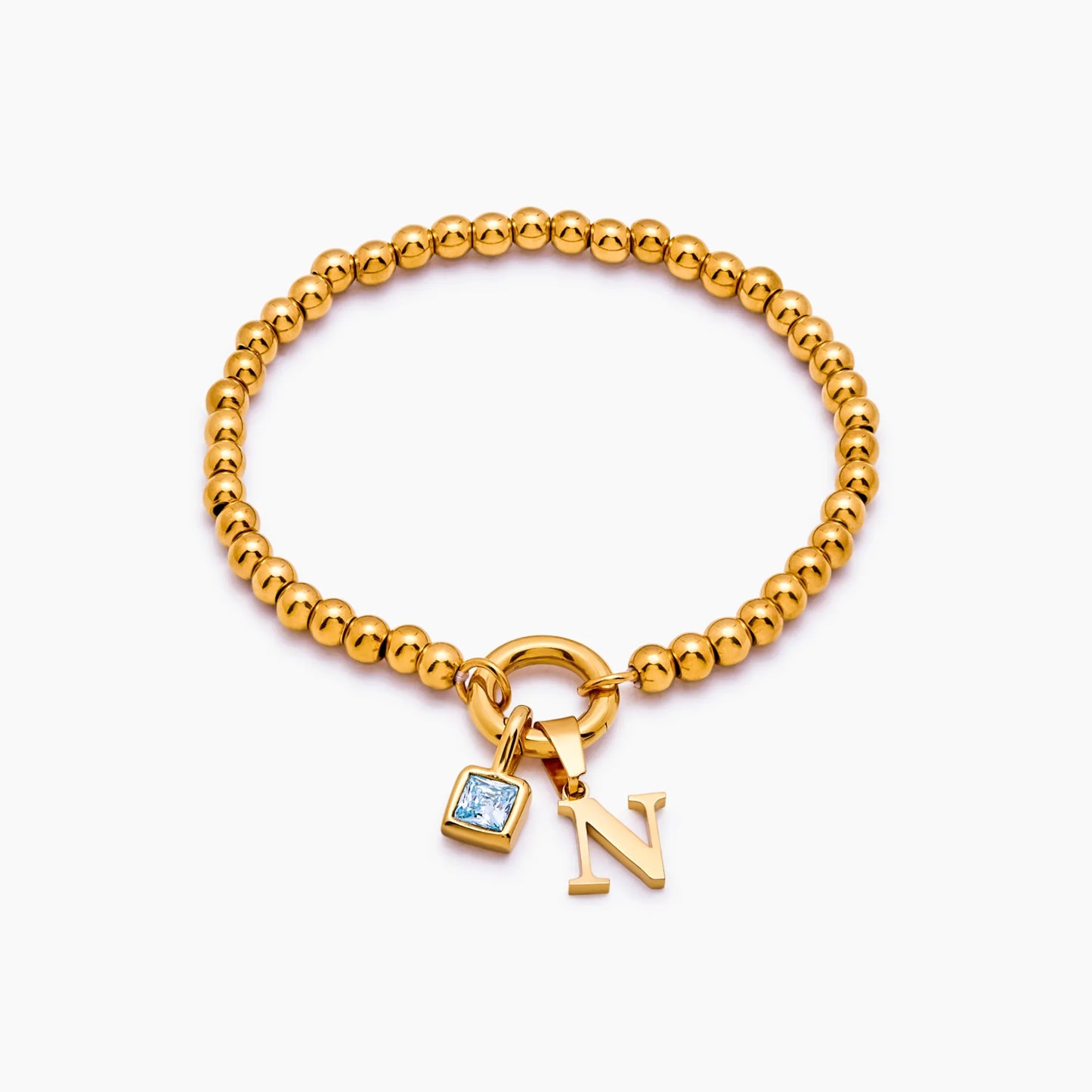 Pulsera de cuentas con inicial y piedra de nacimiento