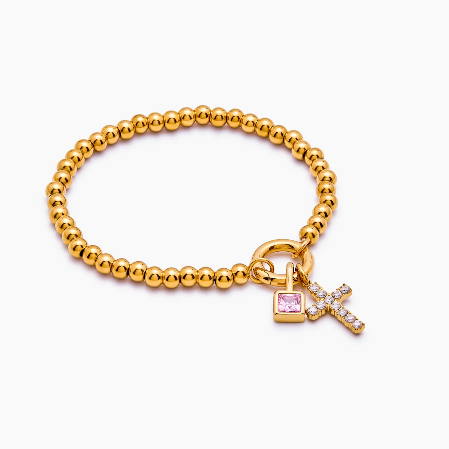 Pulsera de cuentas con cruz de piedra de nacimiento