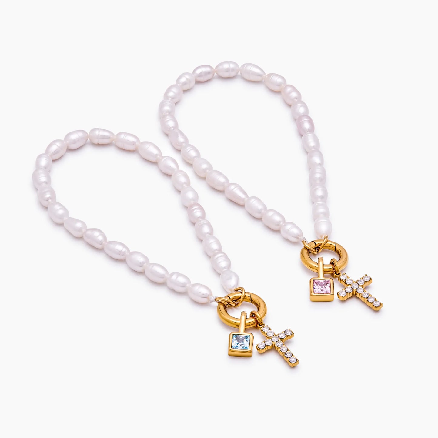 Pulsera con dije de cruz y piedra natal de perla
