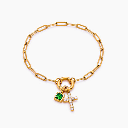 Pulsera con dije de clip y cruz