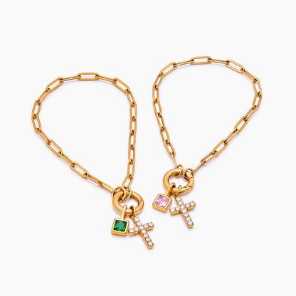 Pulsera con dije de clip y cruz