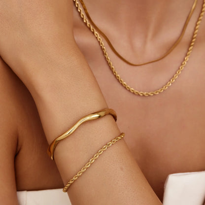 Pulsera de cadena trenzada con baño de oro de 18 quilates - Mujer